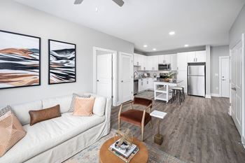 a living room with a couch and a table